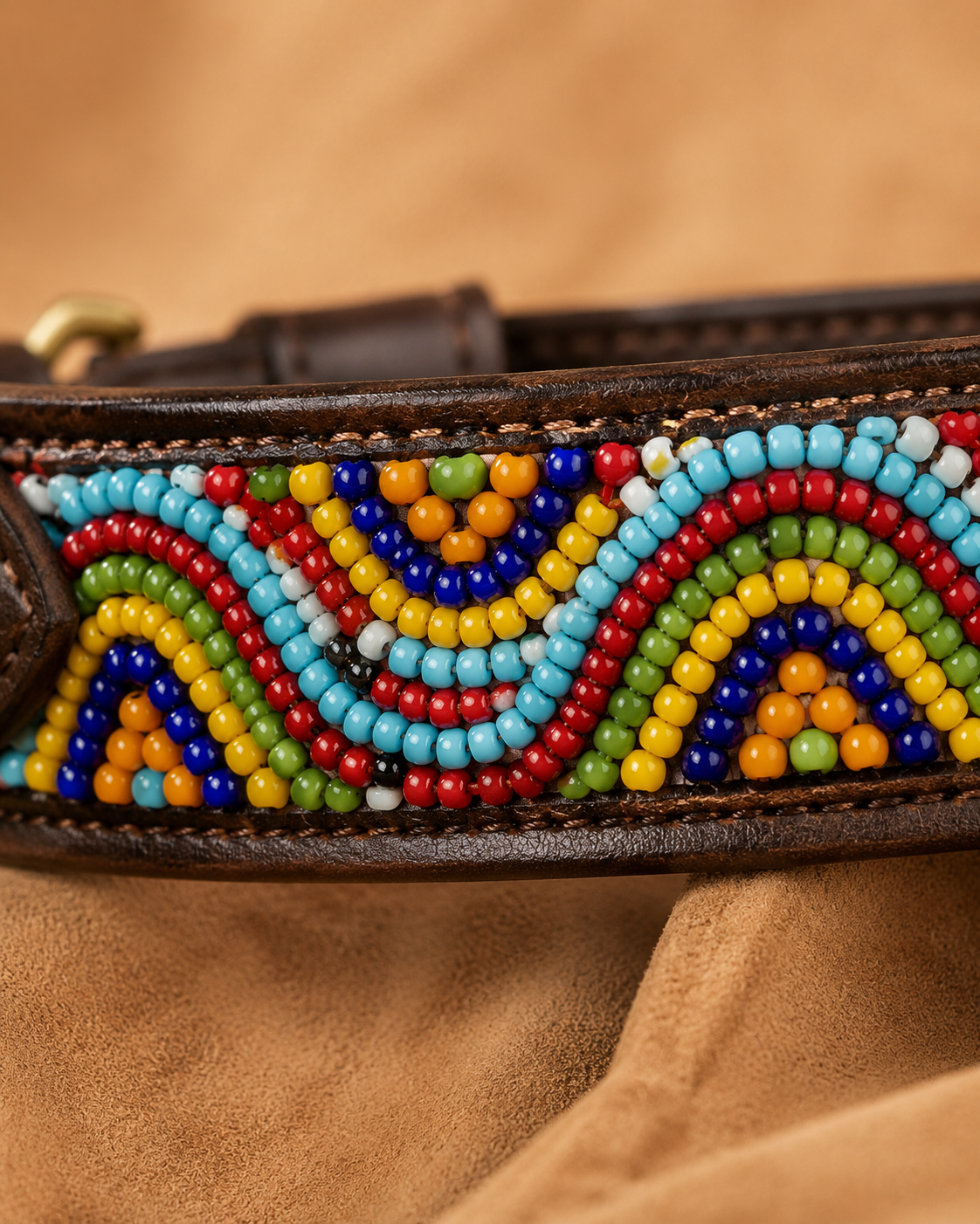 Macro close-up of multicolored flowing-wave Maasai beadwork on the Savanna Tide leather dog collar